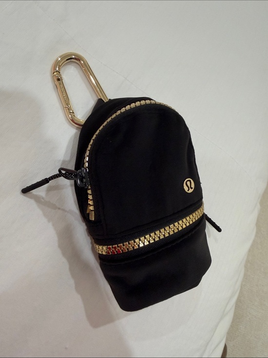 lululemon athletica Handbags - lululemon athletica Black Mini Backpack Keychain Pouch with Gold Hardware